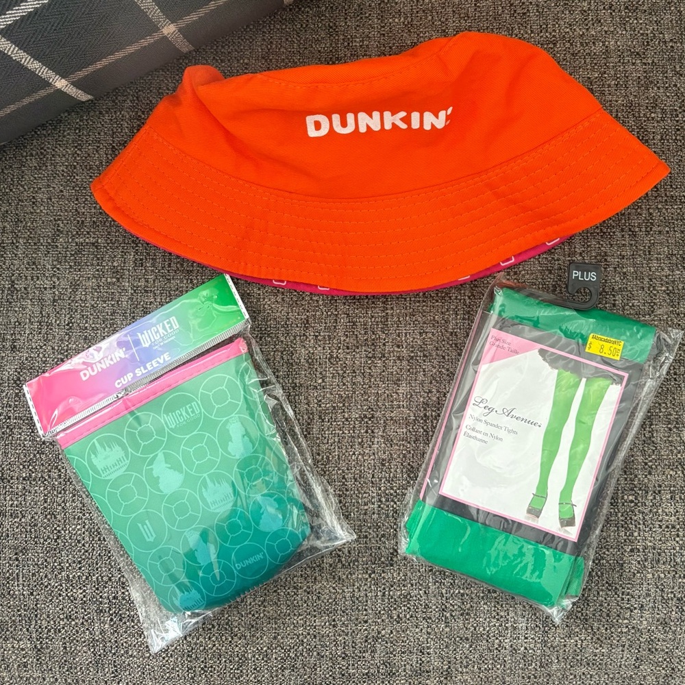 Dunkin' Wicked cup sleeve with green tights and reversible Dunkin’ Hat.